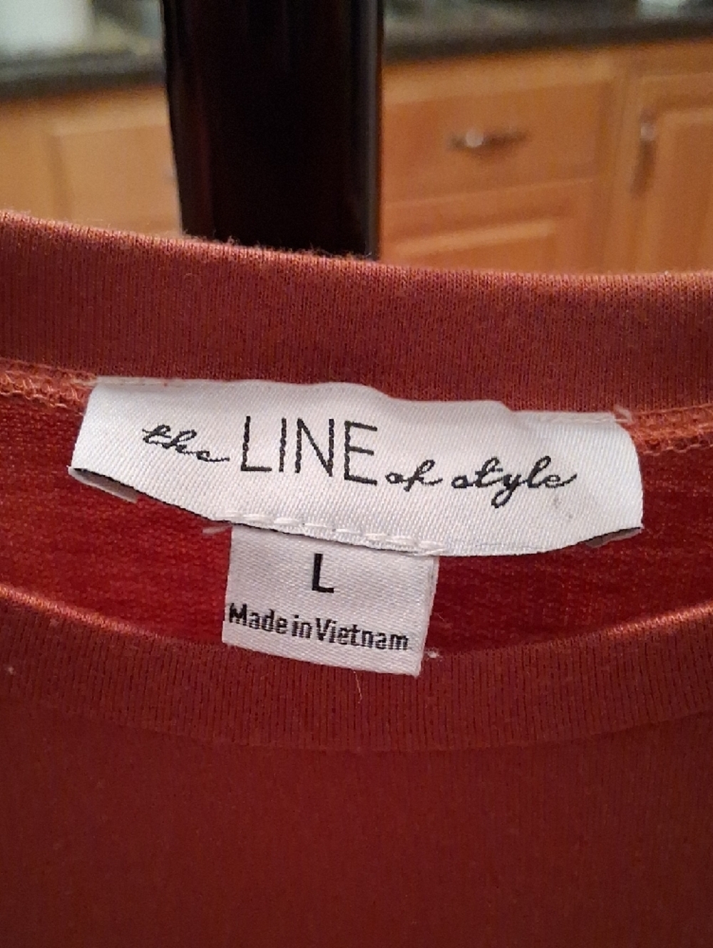Ruffle-Front Sweatshirt in Rust - Picture 2 of 10